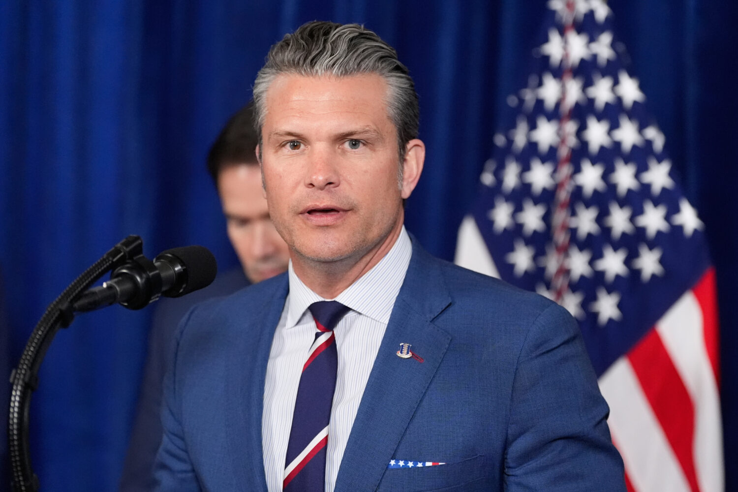 Defense Secretary Pete Hegseth speaks at Mar-a-Lago, Saturday, Jan. 3, 2026, in Palm Beach, Fla. (A...