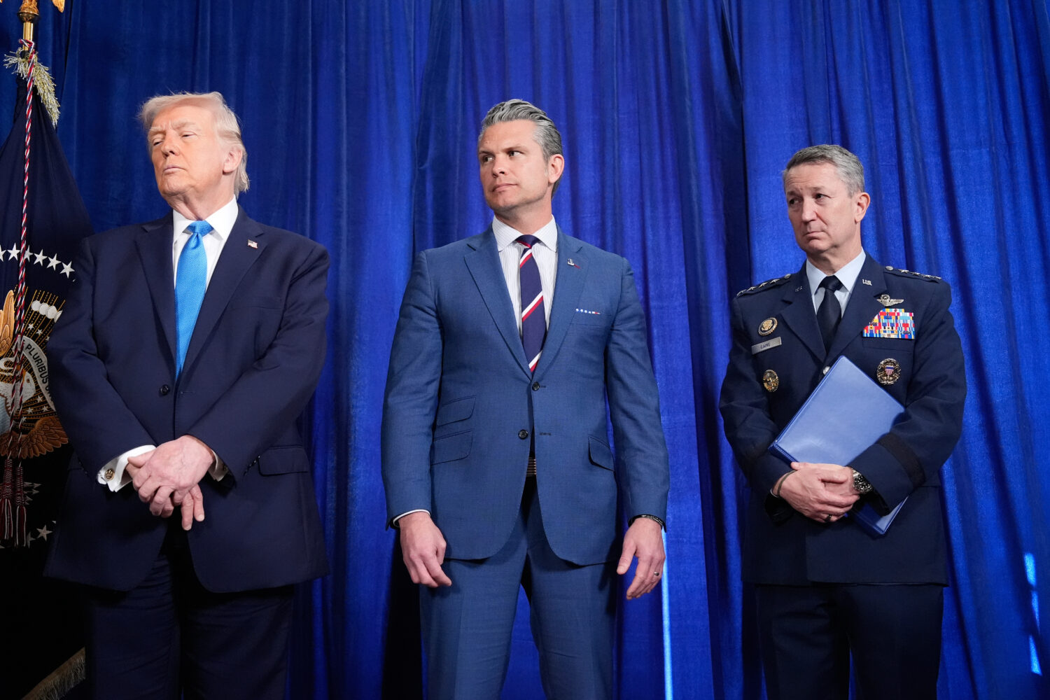 President Donald Trump, Defense Secretary Pete Hegseth and Chairman of the Joint Chiefs of Staff Ge...
