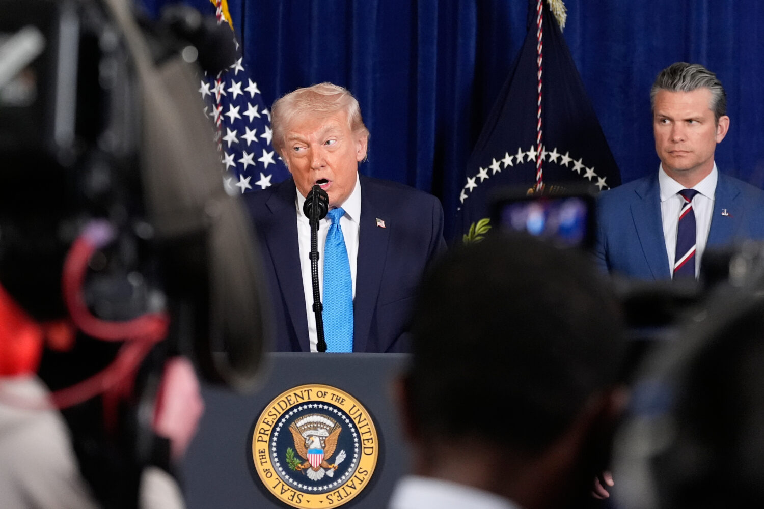 President Donald Trump speaks at his Mar-a-Lago club, Saturday, Jan. 3, 2026, in Palm Beach, Fla., ...