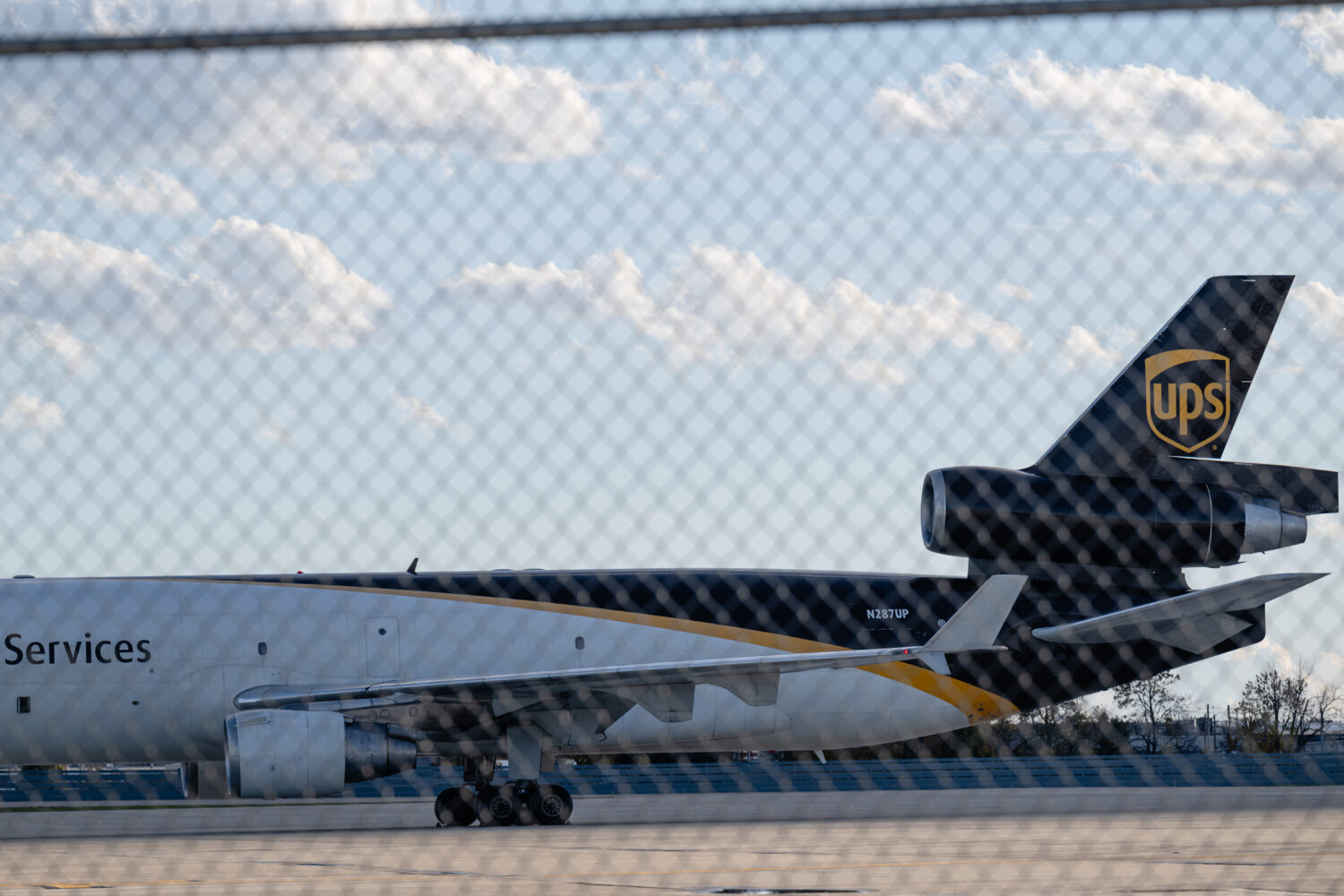 FILE - An MD-11F is seen parked at the UPS North Maintenance Hangar, Nov. 8, 2025, in Louisville, K...