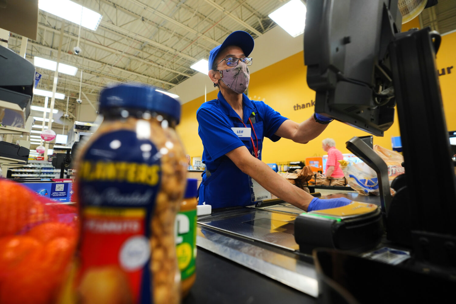 FILE -A cashier rings up groceries in Dallas, Aug. 28, 2025. (AP Photo/LM Otero, File)Credit: ASSOC...