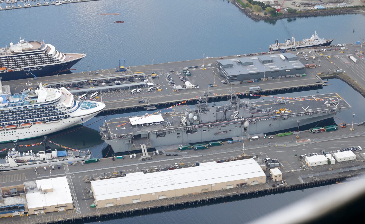 FILE -In this aerial photo taken Aug. 2, 2014, the U.S. Navy USS Essex is shown docked near downtow...