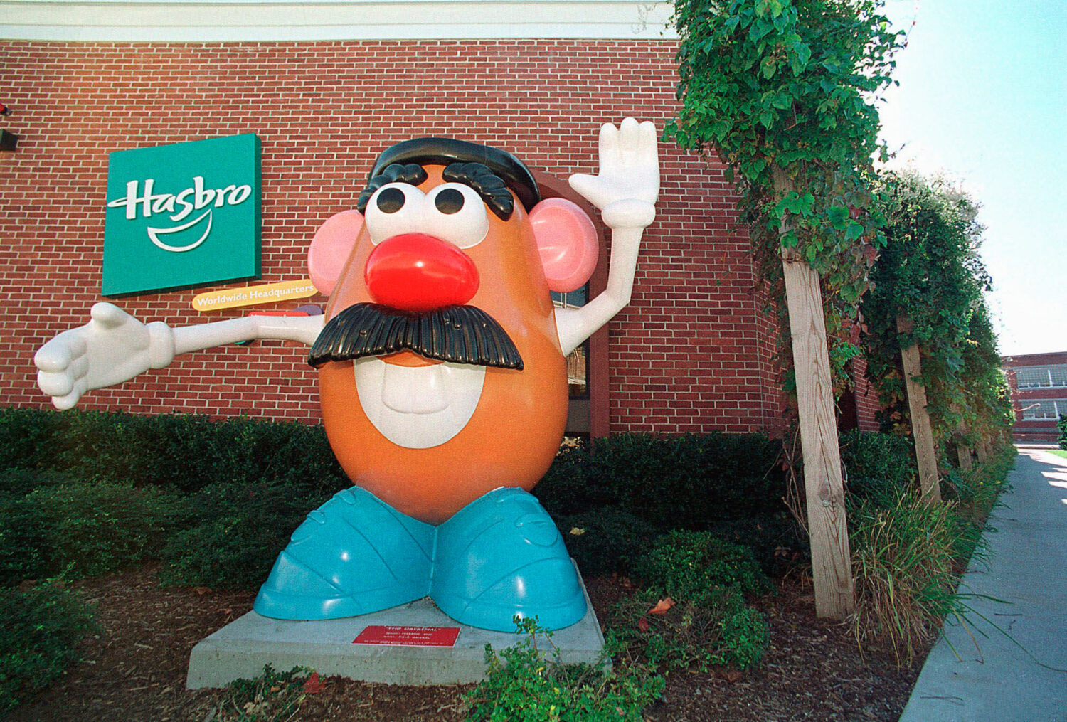 FILE - In this Oct. 12, 2000 file photo, a Mr. Potato Head statue stands outside the Hasbro, Inc. h...