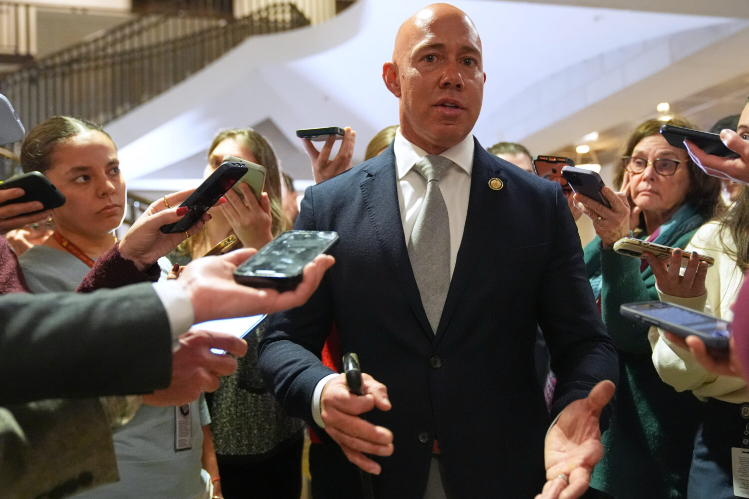 Rep. Brian Mast, R-Fla., speaks to reporters at the U.S. Capitol Monday, Jan. 5, 2026, in Washingto...