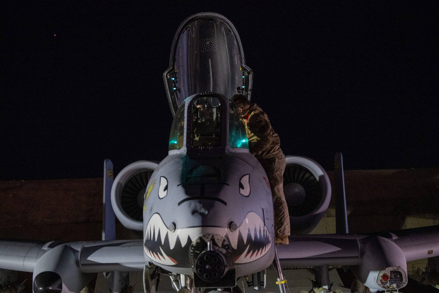 This photo provided by the U.S. Air Force shows a U.S. Airman preparing an A-10 Thunderbolt II for ...