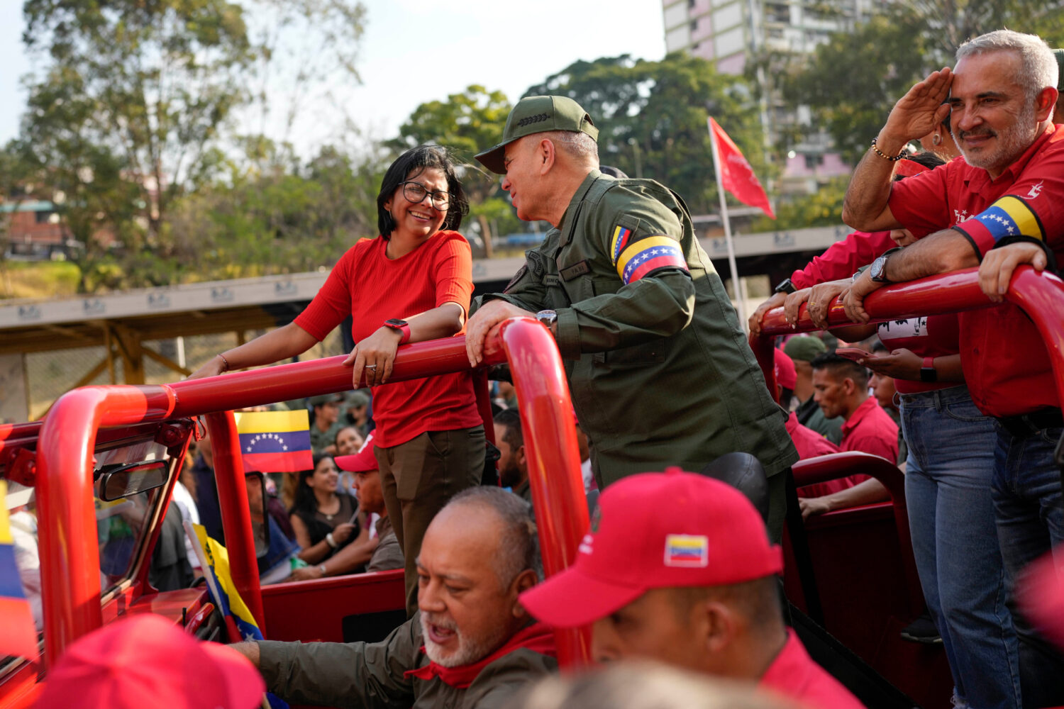 FILE - Vice President Delcy Rodriguez, left, smiles at Venezuelan Defense Minister Padrino Lopez, a...