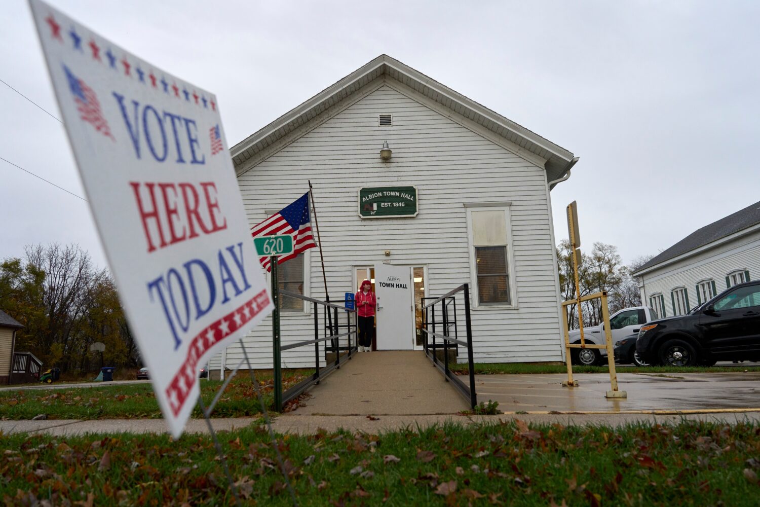 FILE - A voter leaves Albion Town hall after casting their ballot on Election Day, Nov. 5, 2024, in...