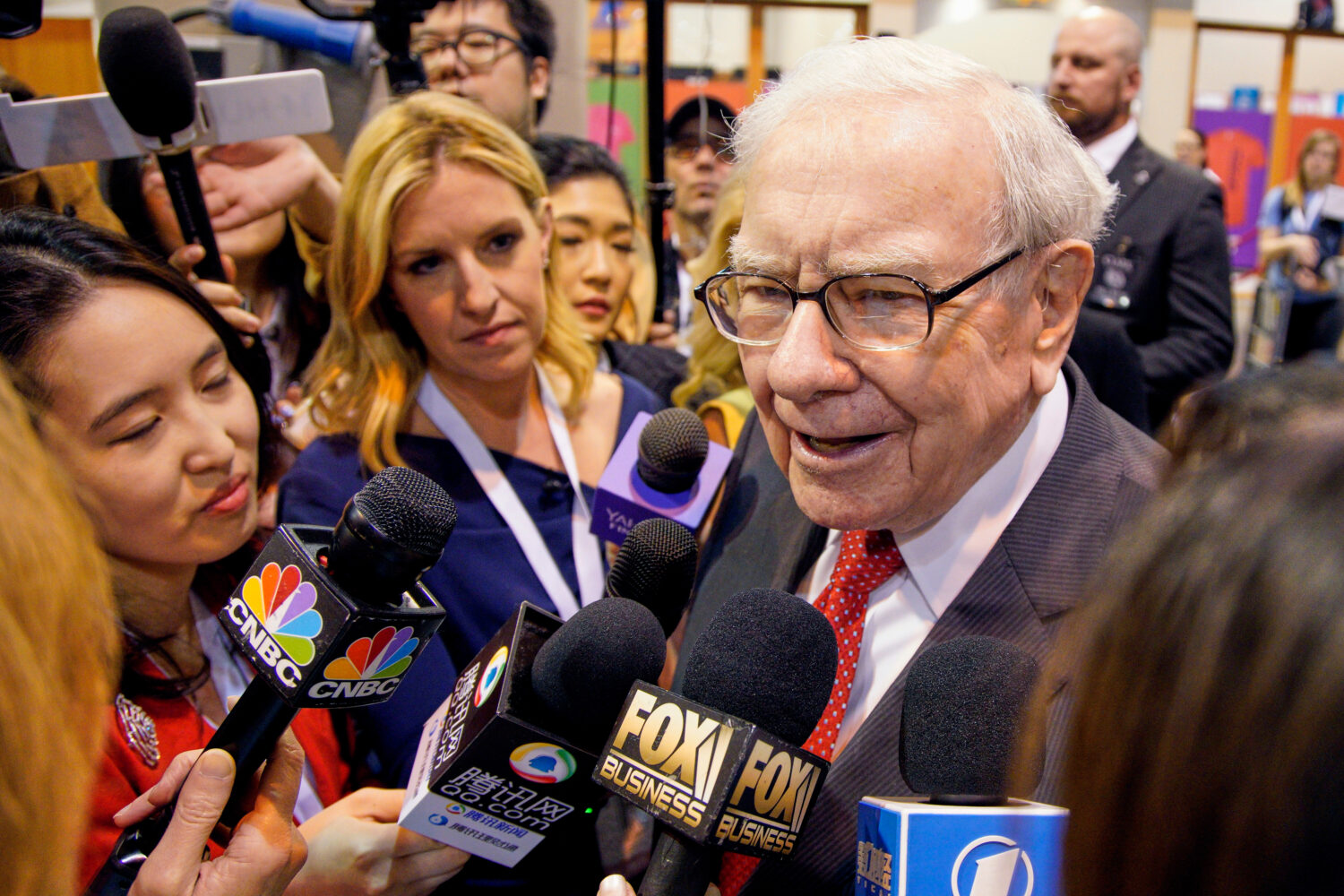 FILE - Warren Buffett, Chairman and CEO of Berkshire Hathaway, speaks to reporters before presiding...