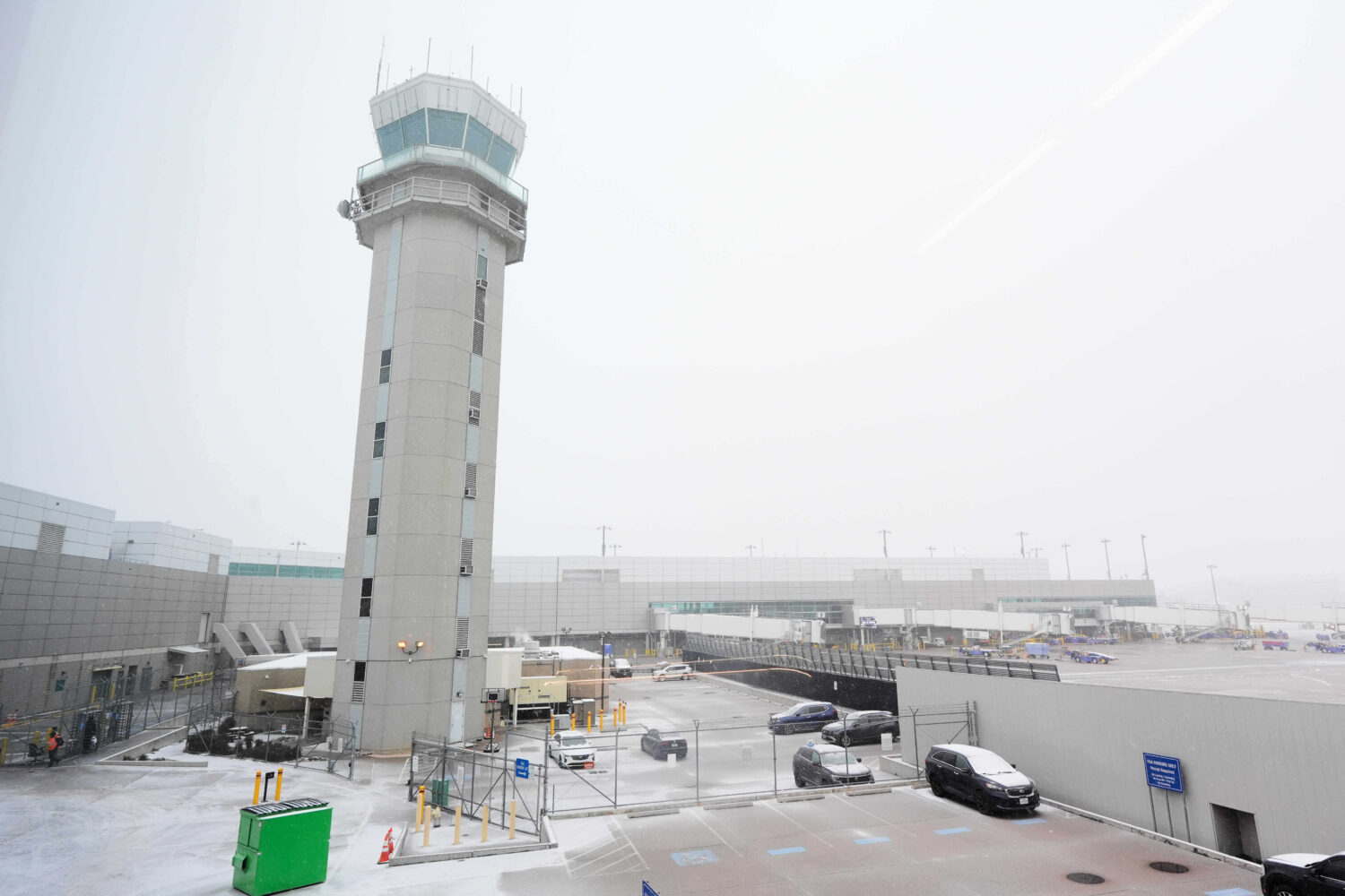 The control tower at Love Field Airport is shown where weather conditions have had an impact on tra...