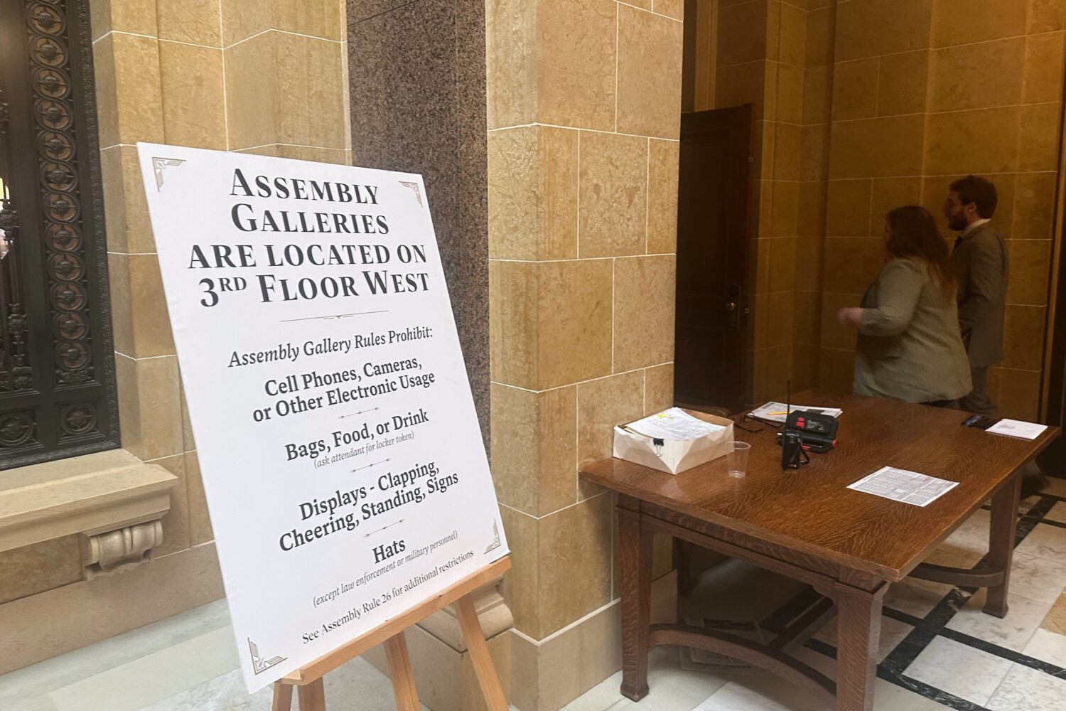 A sign outside of the Wisconsin Assembly chamber reminds visitors of a prohibition on livestreaming...
