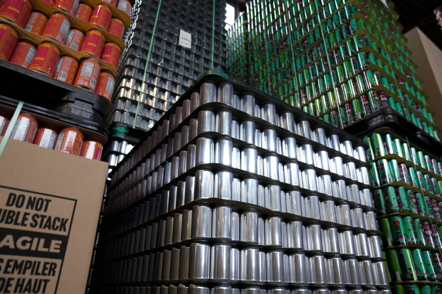 Empty aluminum cans are stacked at Revolution Brewing, Friday, Feb. 20, 2026, in Chicago. (AP Photo...