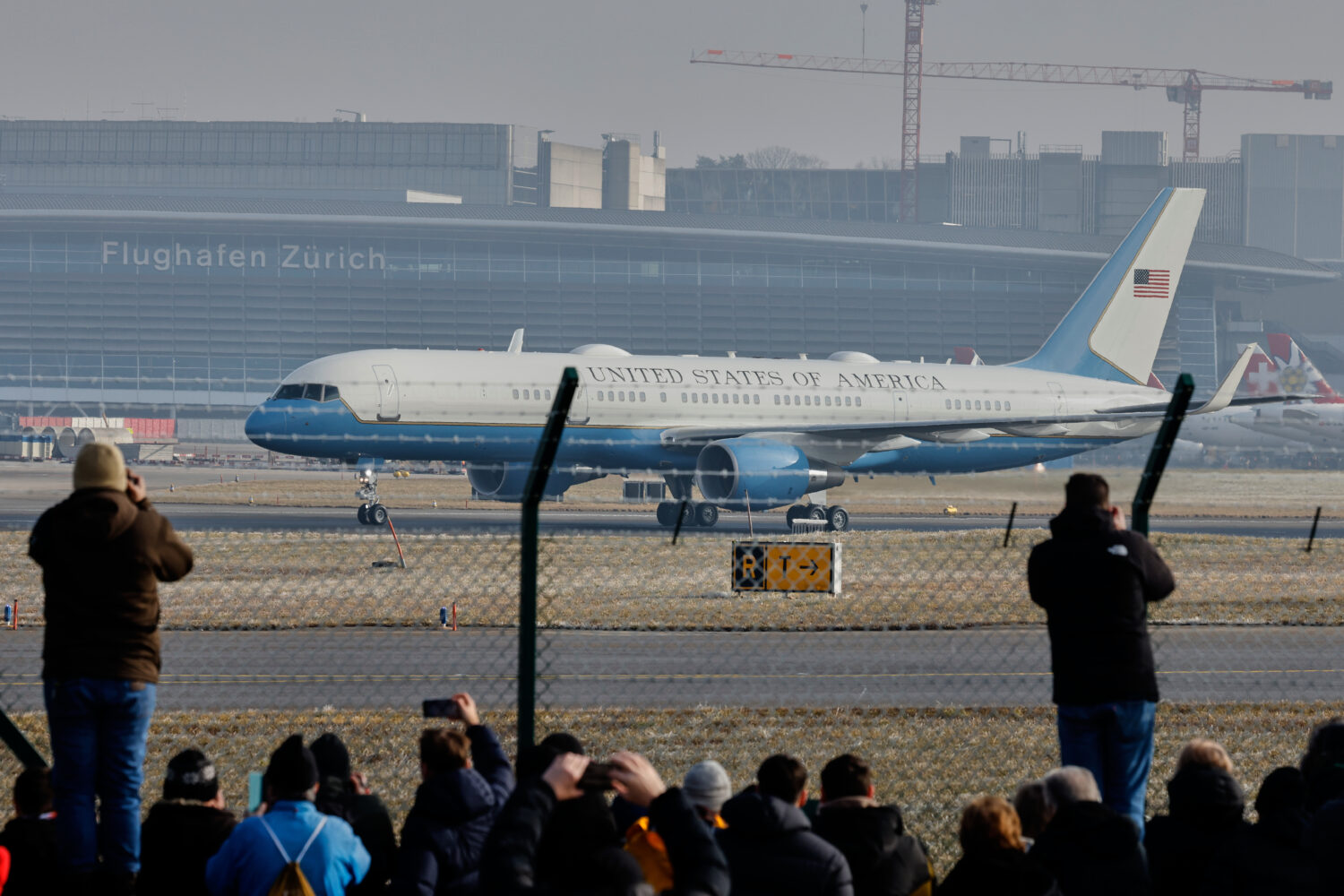 Air Force One lands at the airport in Zurich, Switzerland, Wednesday, Jan. 21, 2026. (AP Photo/Arnd...
