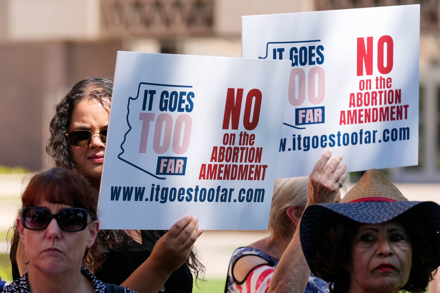 FILE - Anti-abortion protesters gather for a news conference after Arizona abortion-rights supporte...