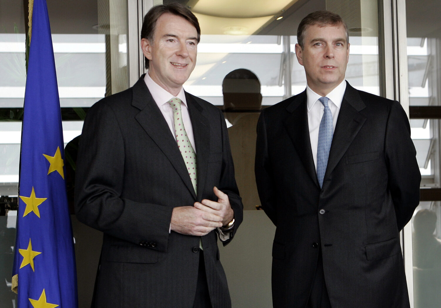 FILE - EU Commissioner for Trade Peter Mandelson, left, poses with Andrew Mountbatten-Windsor, as h...