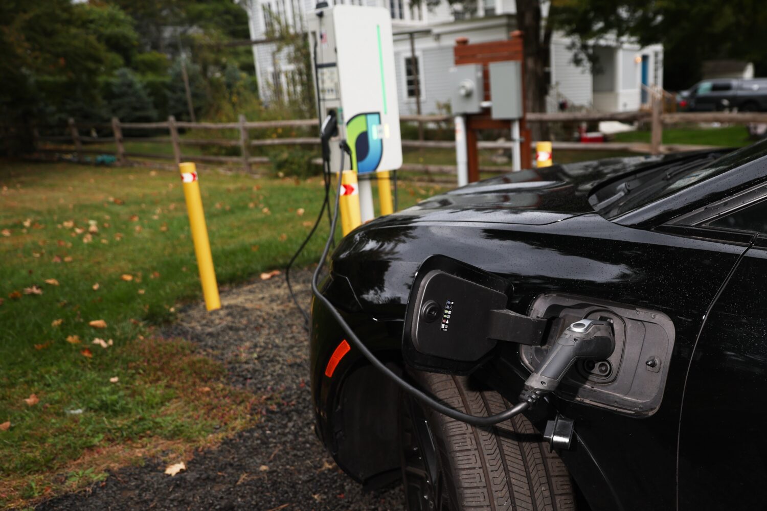 FILE - Daphne Dixon's electric vehicle is plugged into a Level 2 EV charger Oct. 11, 2025, in Norwa...