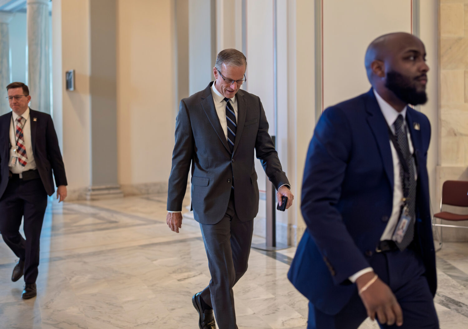 Senate Majority Leader John Thune, R-S.D., arrives for the Senate Prayer Breakfast, at the Capitol ...