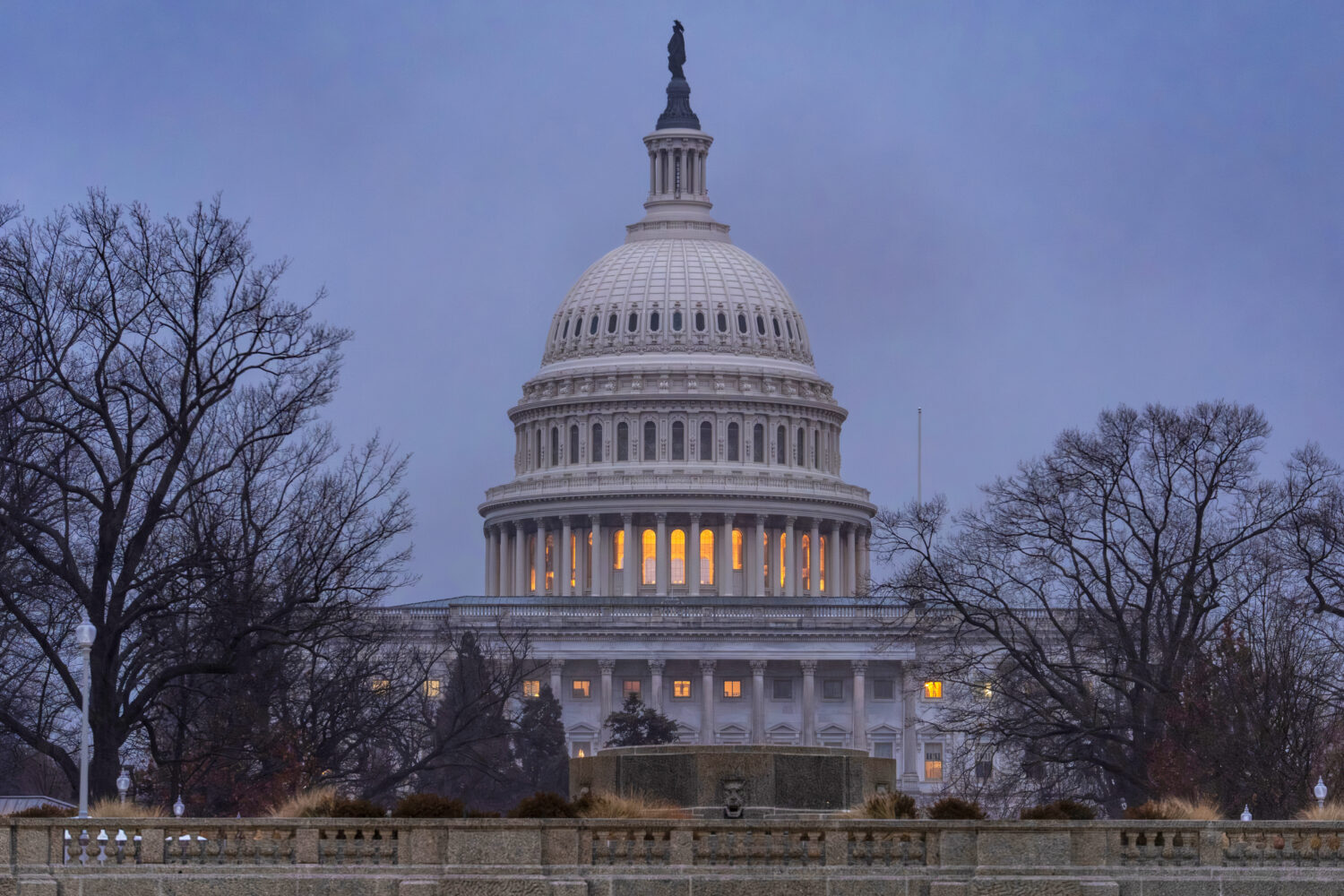 The Capitol is seen during heavy rain as the Department of Homeland Security funding bill remains i...