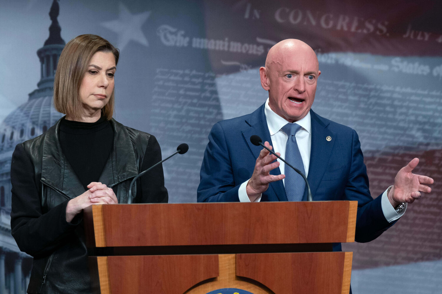 Rep. Elissa Slotkin, D-Mich., and Sen. Mark Kelly, D-Ariz., speak during a news conference at Capit...