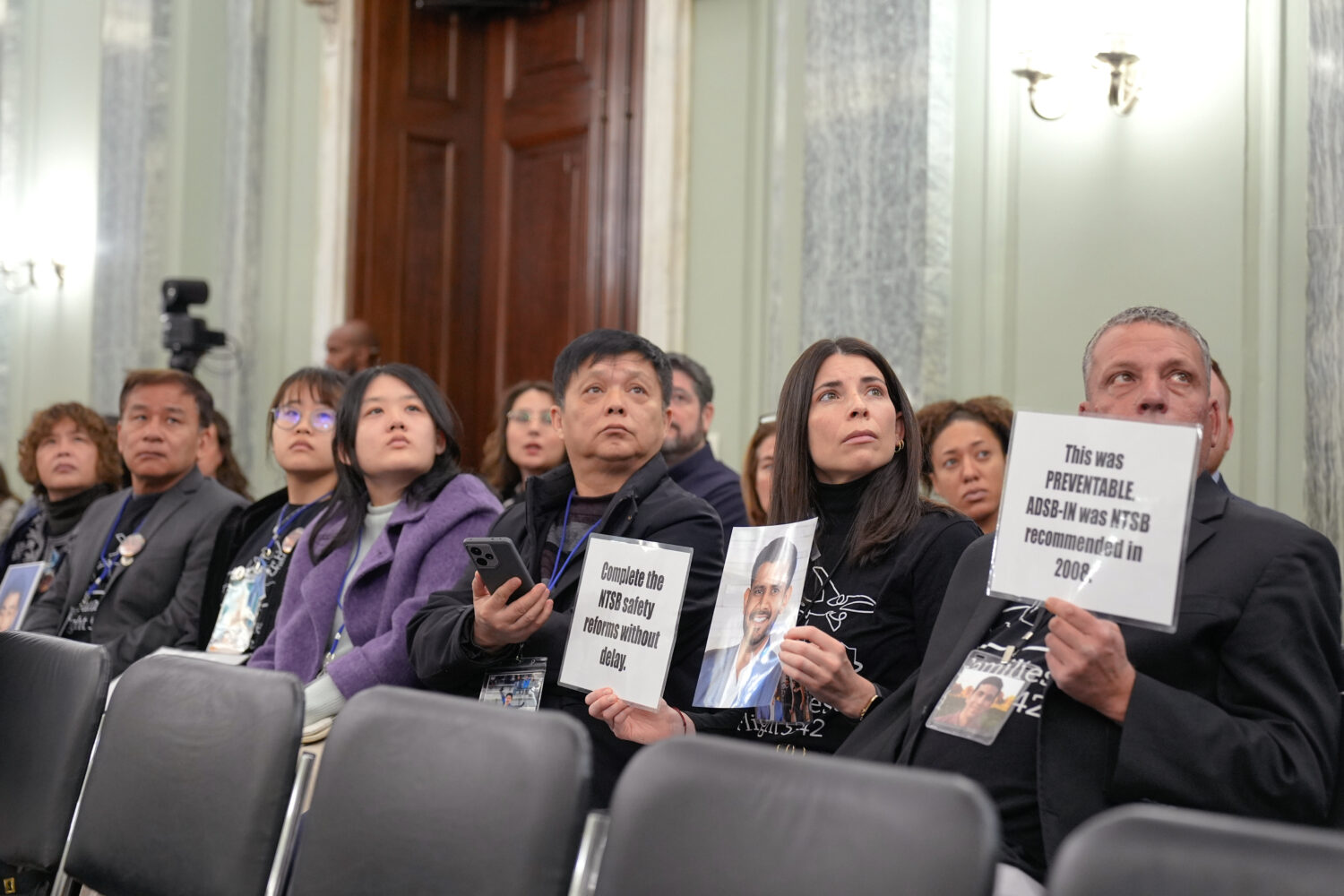 Family members of the people who were killed in the midair collision near Washington Reagan Nationa...