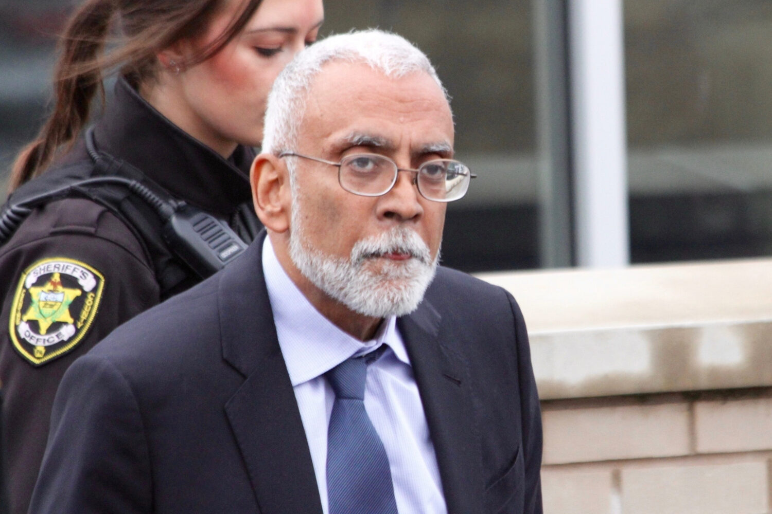 FILE - Subramanyam Vedam walks outside the Centre County Courthouse, Feb. 6, 2025, in Bellefonte, P...