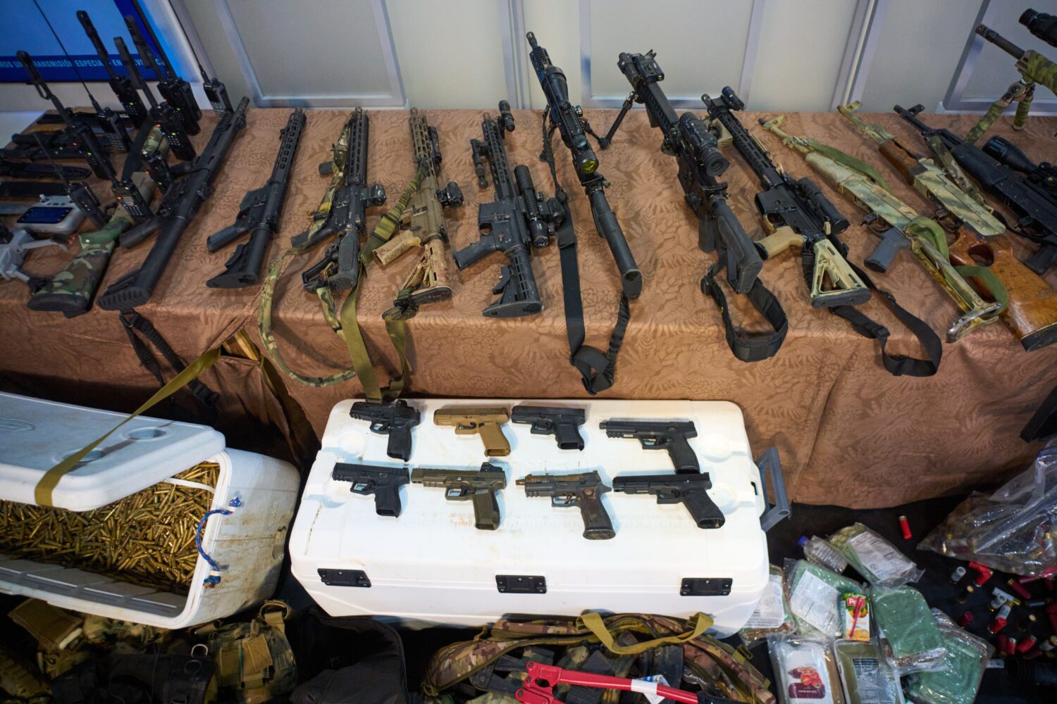 Weapons that Cuban authorities say were recovered from a speedboat in Cuban waters following a conf...
