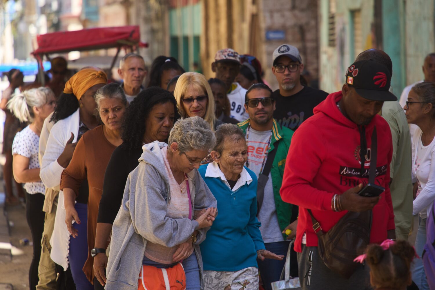 People wait in line to enter a government office in Havana, Cuba, Wednesday, Feb. 11, 2026. (AP Pho...