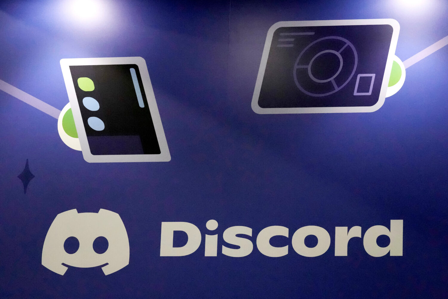FILE - A Discord display stands at the company's booth at the Game Developers Conference 2023, in S...