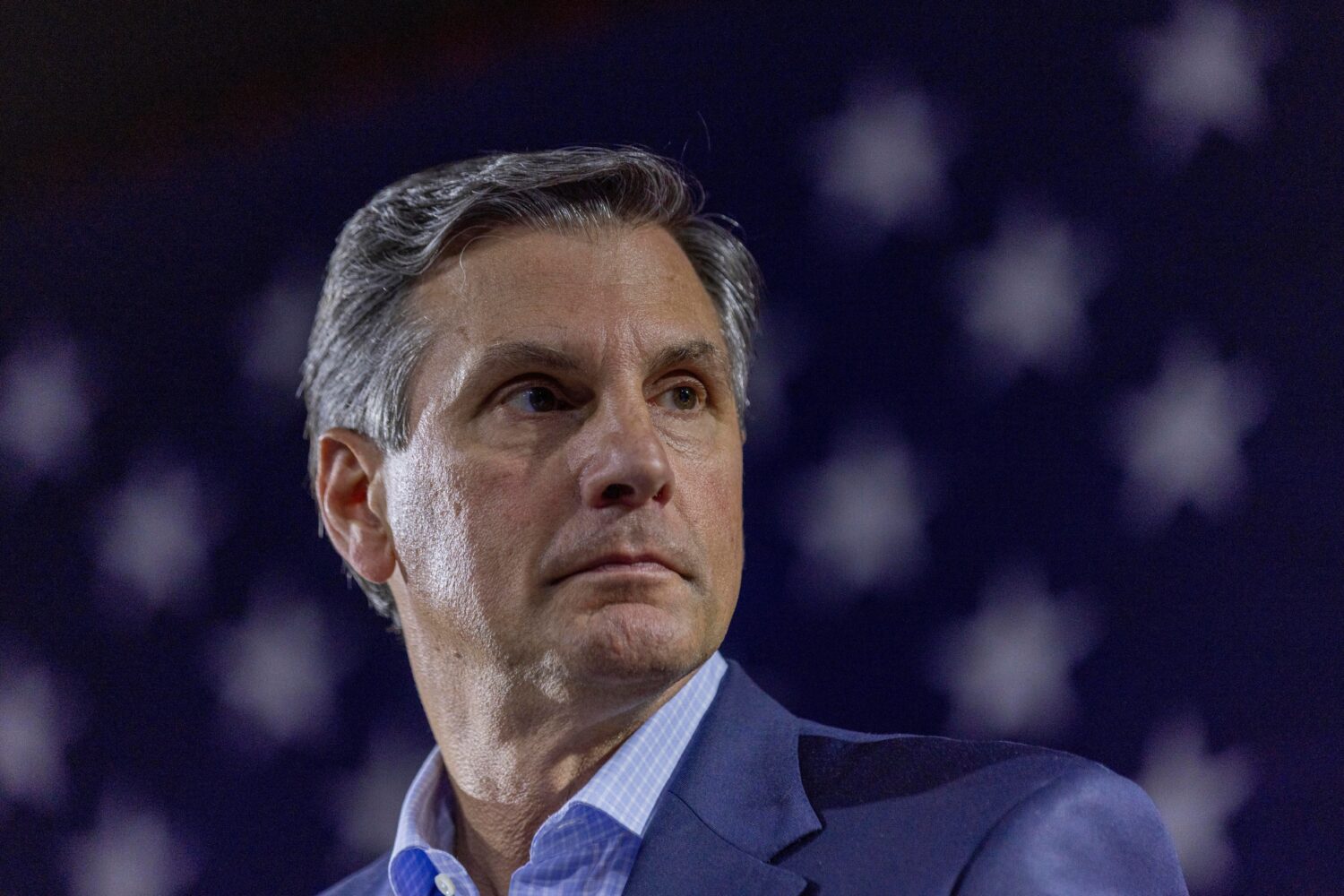 Derek Dooley, a Republican candidate for Senate in Georgia, listens to Georgia Gov. Brian Kemp, not...