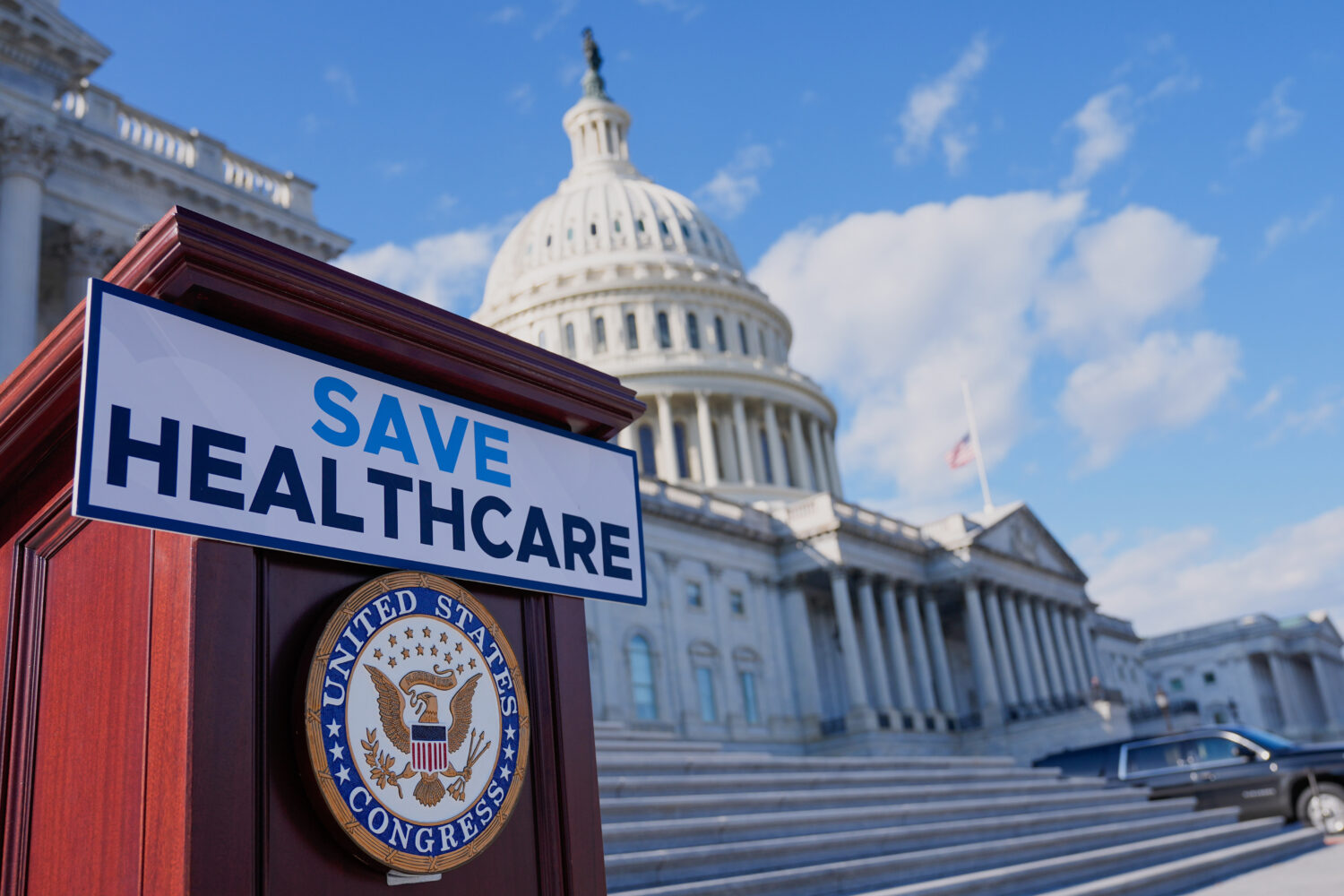 FILE - A podium is prepared before Democrats hold news conference on the health care funding fight ...