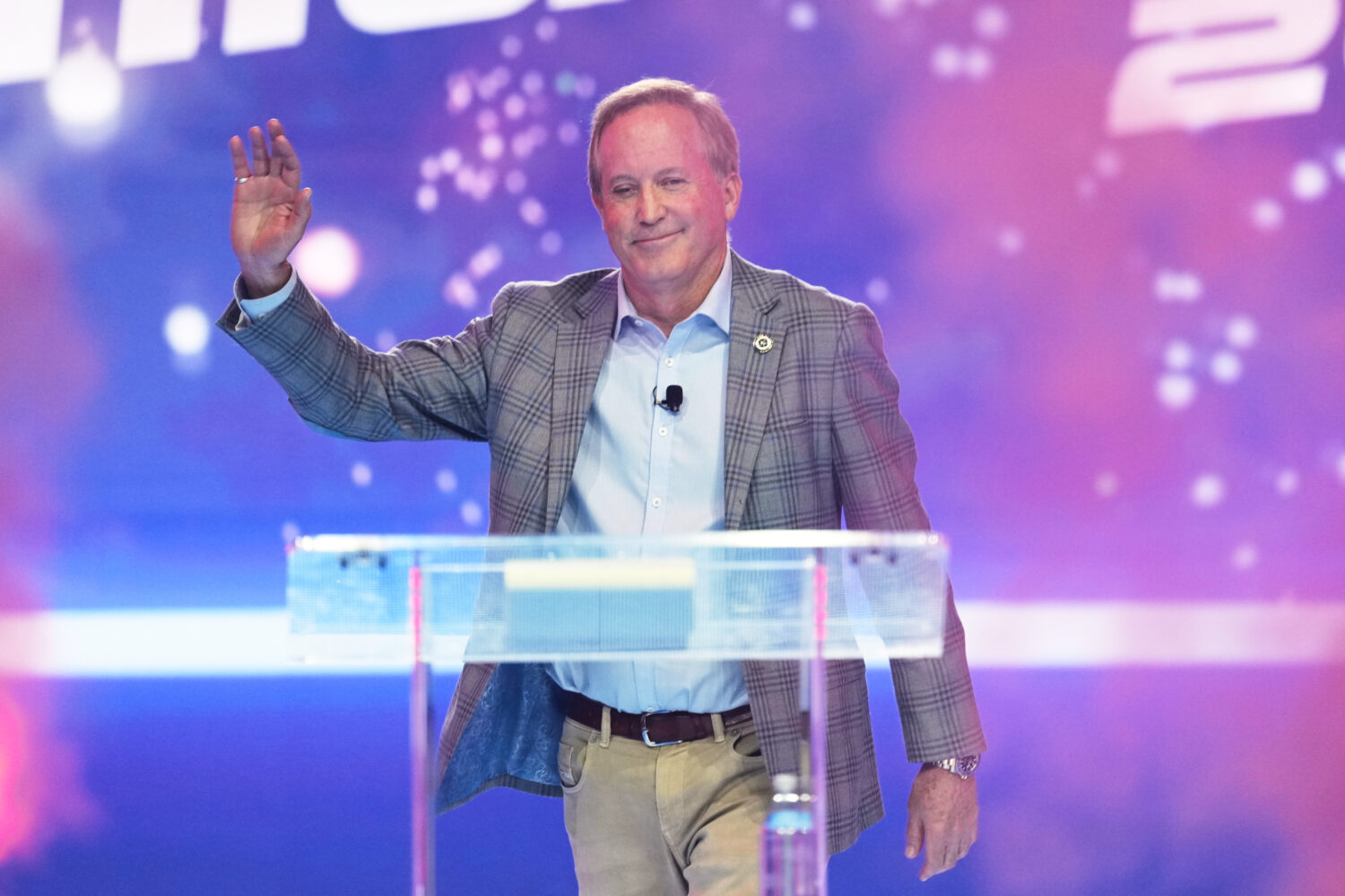 FILE - Texas Attorney General Ken Paxton takes the stage during Turning Point USA's AmericaFest 202...