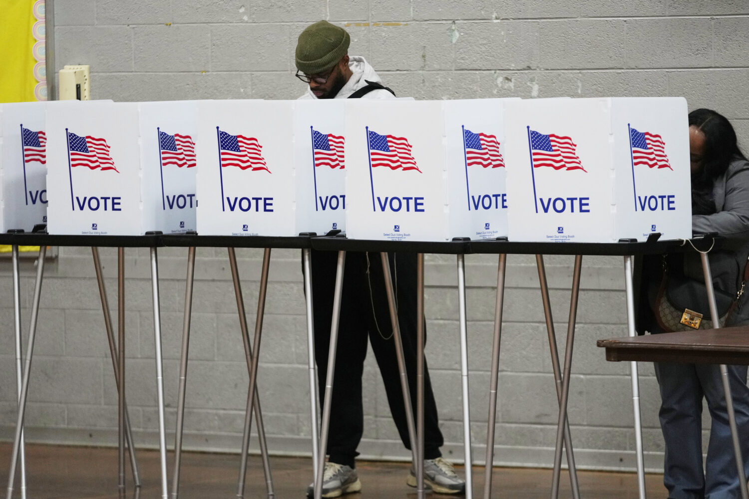 FILE - Voters fill out their ballots Nov. 4, 2025, in Detroit. (AP Photo/Paul Sancya, File)Credit: ...