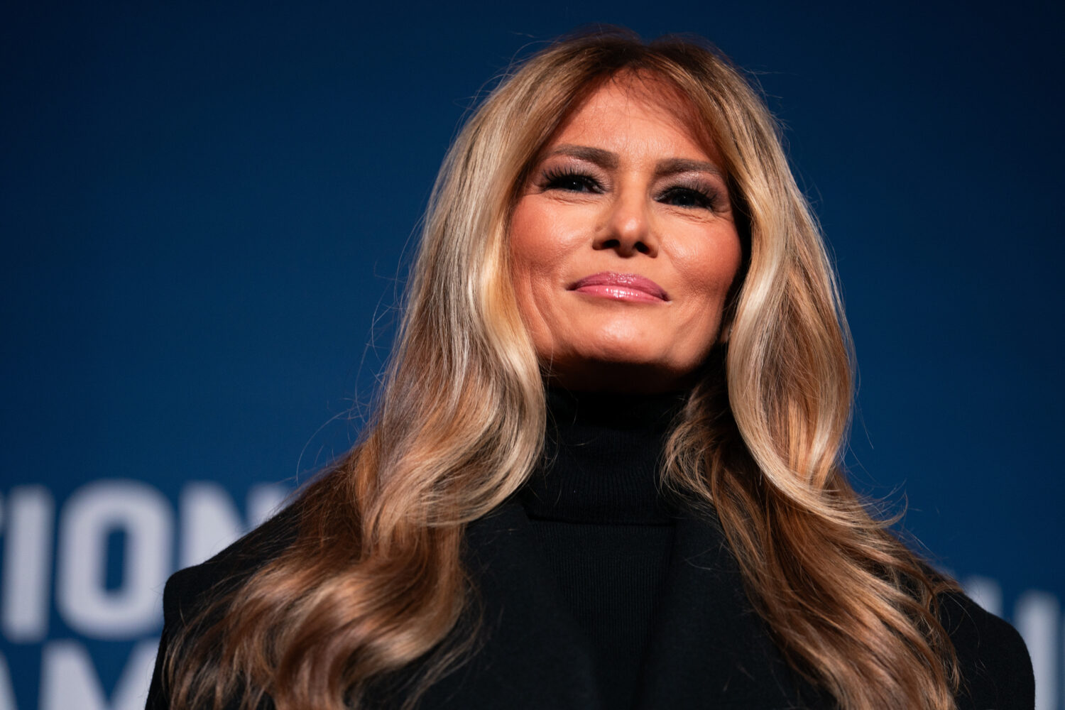 First lady Melania Trump speaks at an event to present her 2025 inaugural ball gown to the Smithson...