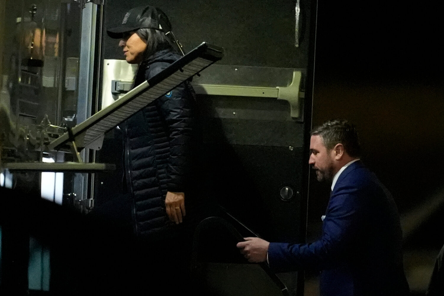 Director of National Intelligence Tulsi Gabbard, left, and FBI Deputy Director Andrew Bailey, enter...