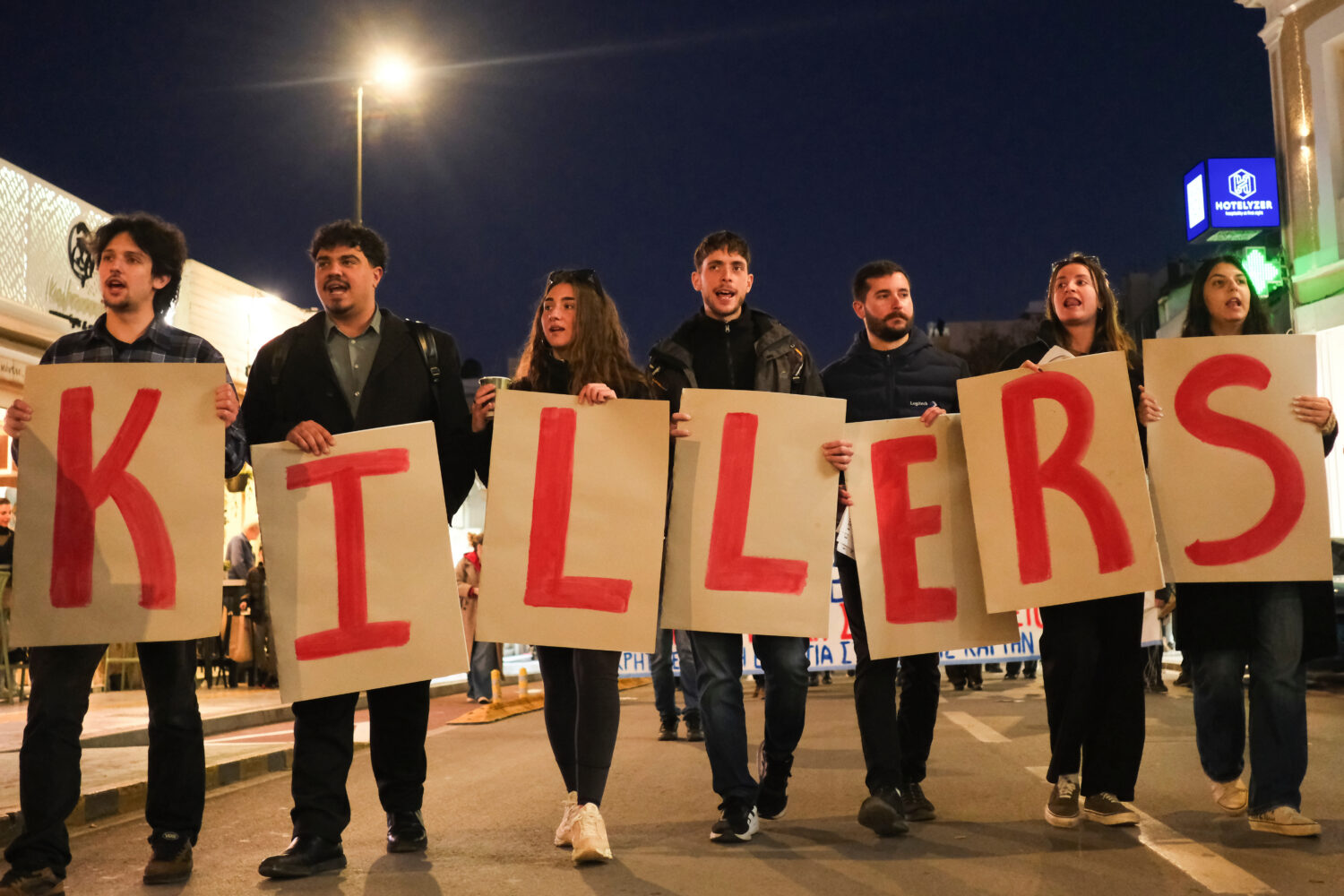 Protesters take part in an anti-war rally in Chania, Greece, opposing the docking of the aircraft c...