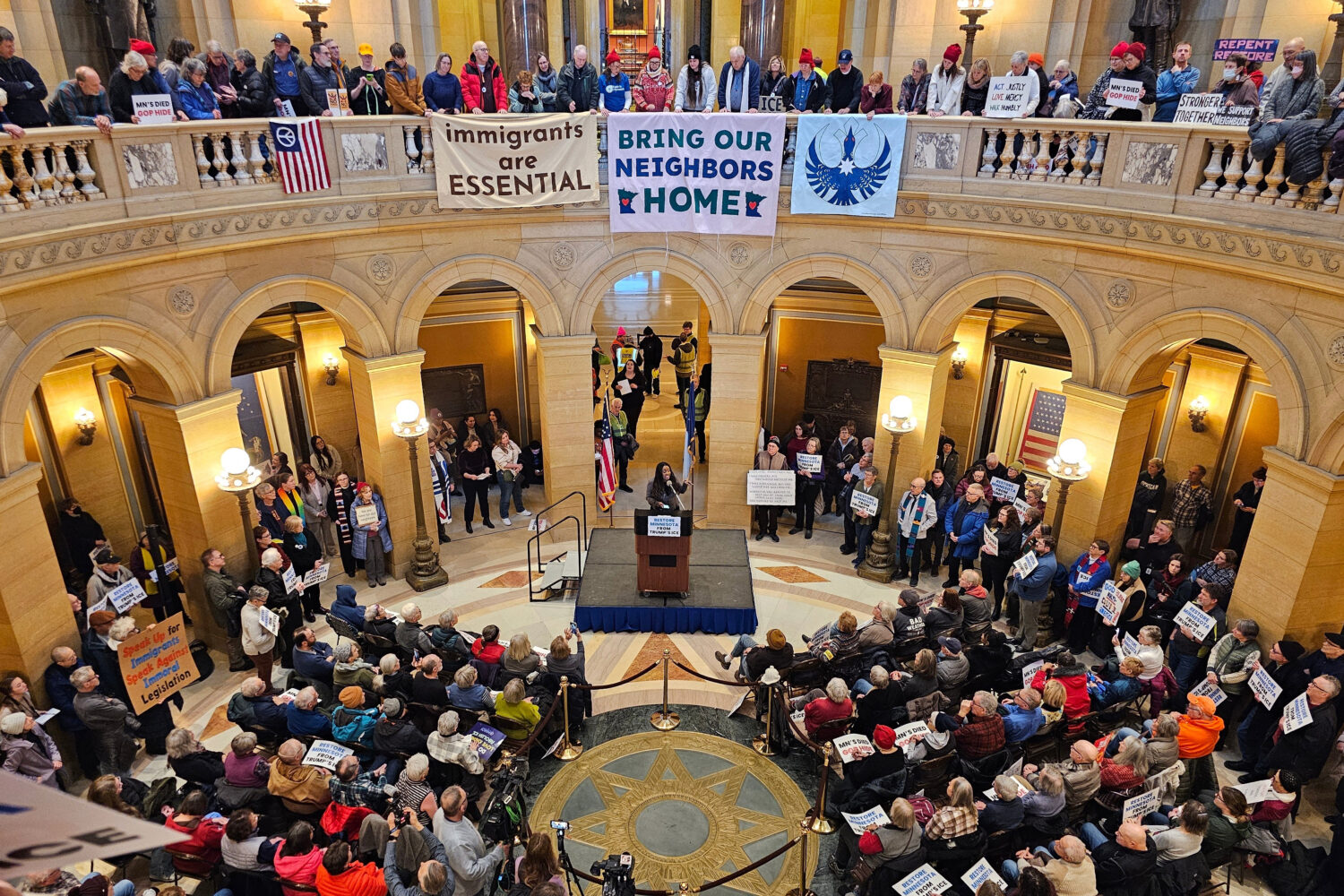 Hundreds of people attend a rally in the rotunda of the Minnesota State Capitol in St. Paul, Minn.,...