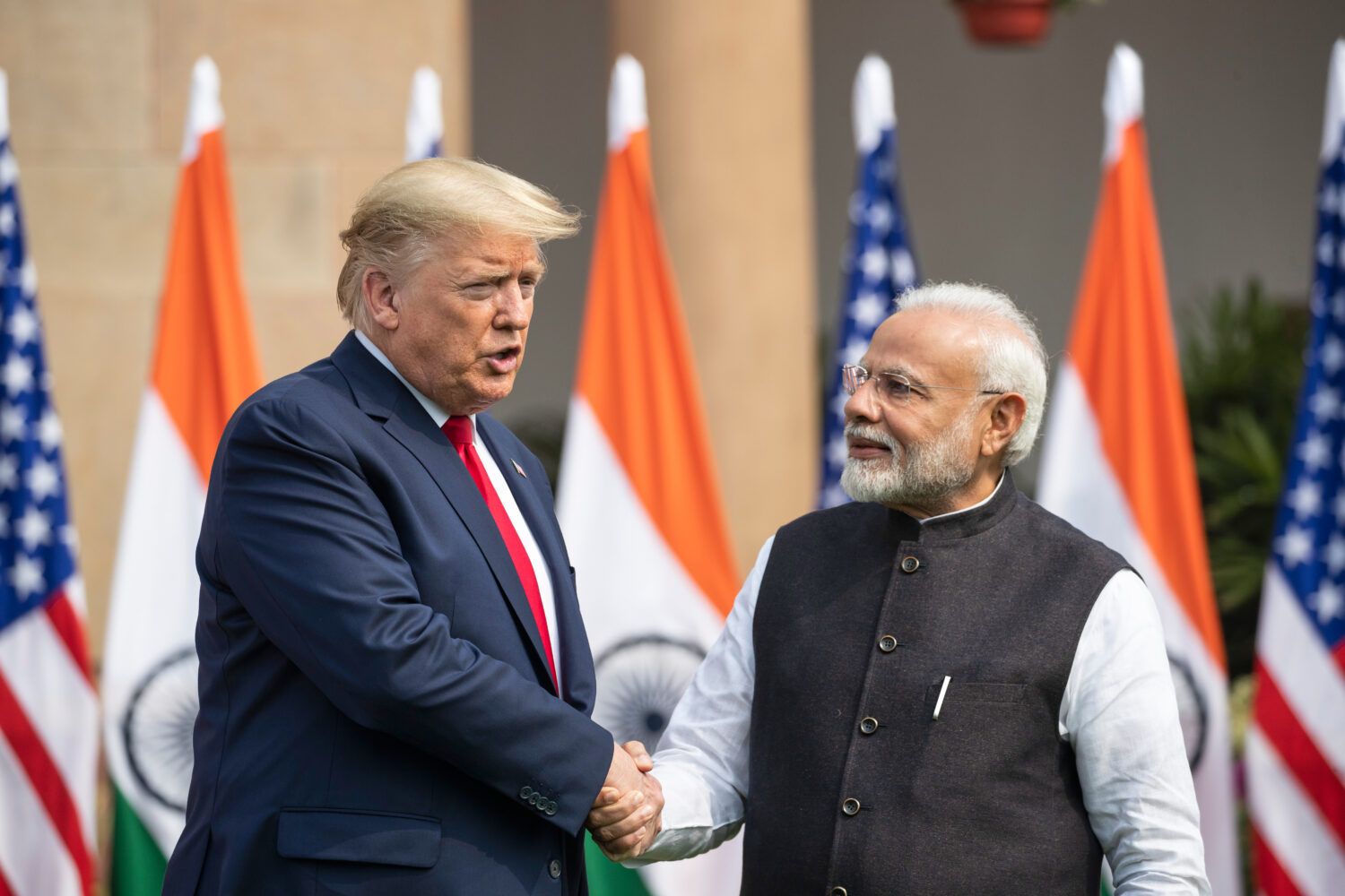 FILE-U.S. President Donald Trump and Indian Prime Minister Narendra Modi shake hands before their m...
