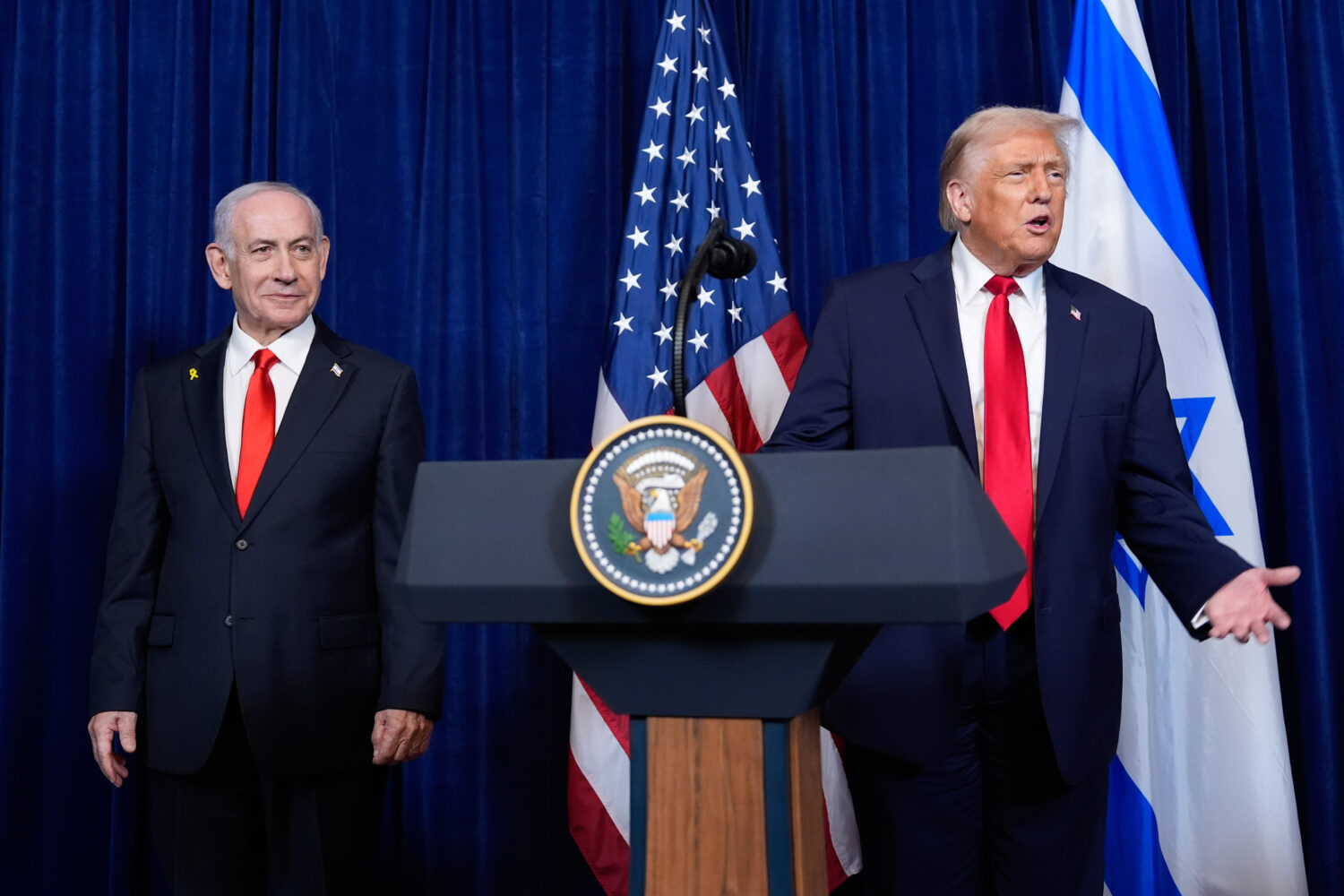 FILE - President Donald Trump answers a question from a reporter at the end of a news conference wi...