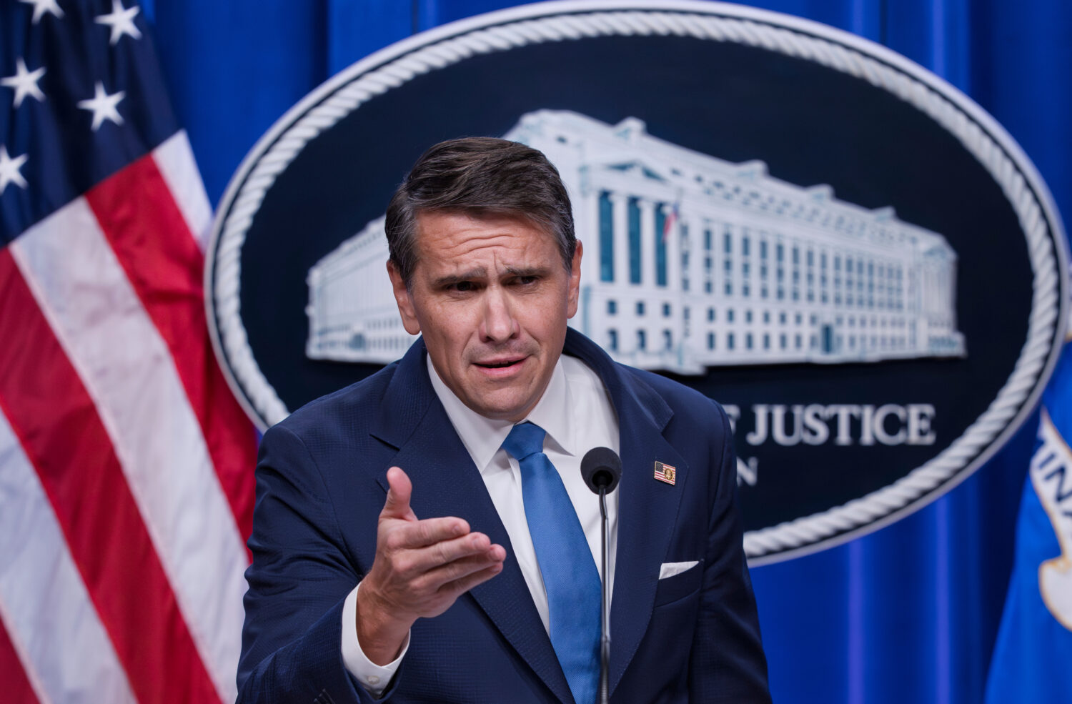 Deputy Attorney General Todd Blanche takes a question from a reporter during a news conference afte...