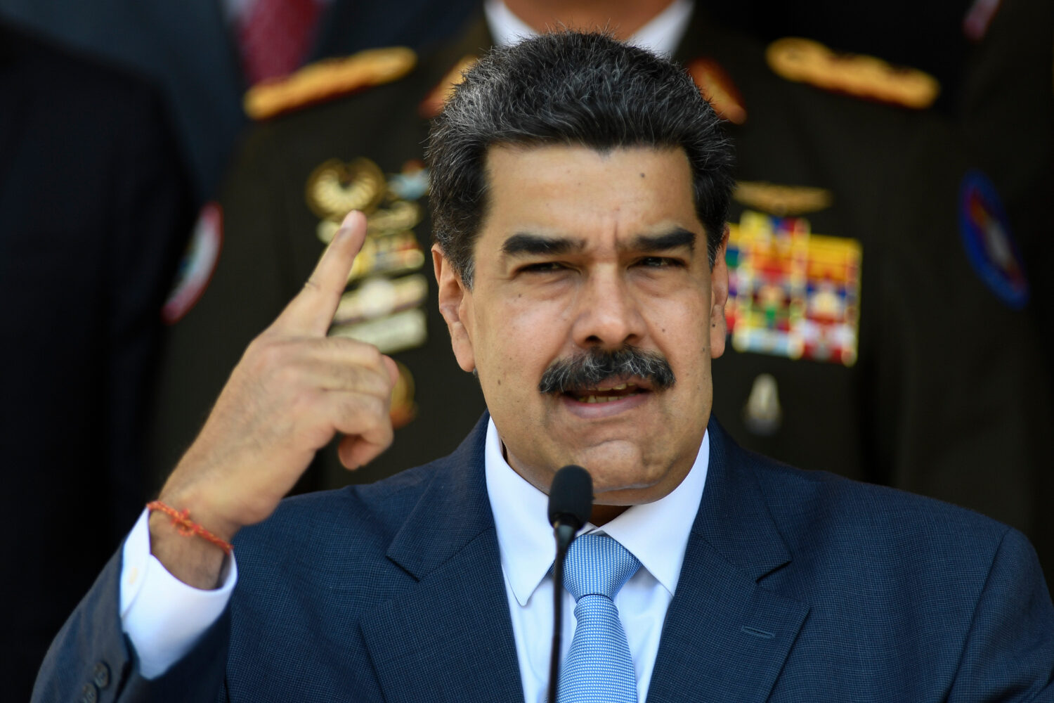FILE - In this March 12, 2020, file photo, Venezuelan President Nicolas Maduro gives a press confer...