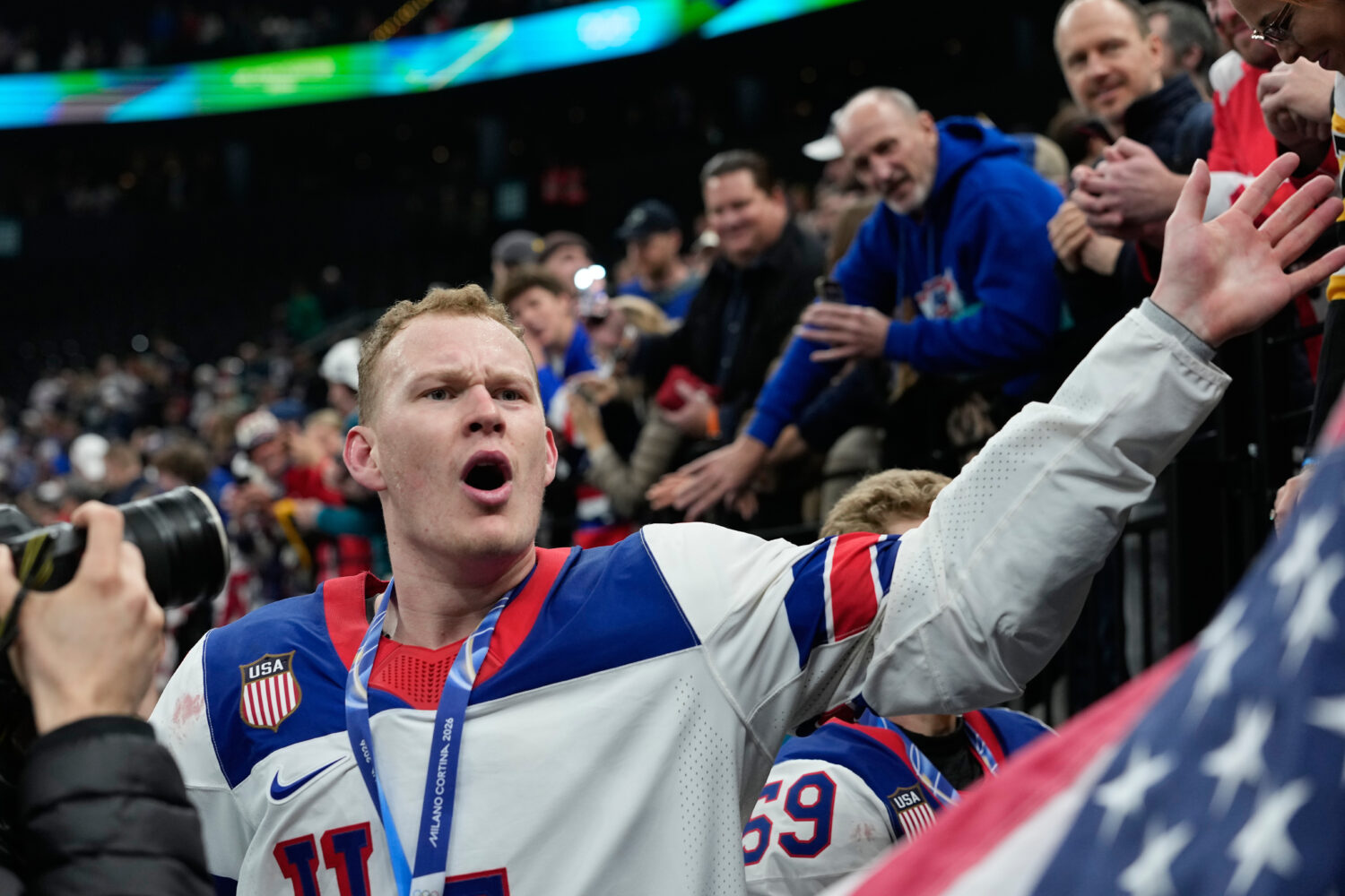 United States' Brady Tkachuk (7) celebrates after the United States defeated Canada in a men's ice ...