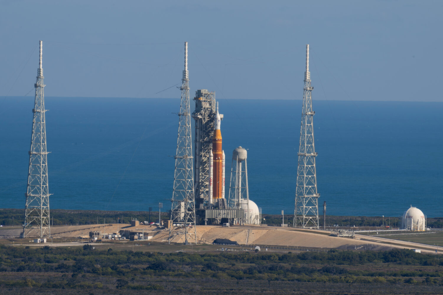 This photo provided by NASA shows the Artemis II SLS (Space Launch System) rocket with the Orion sp...