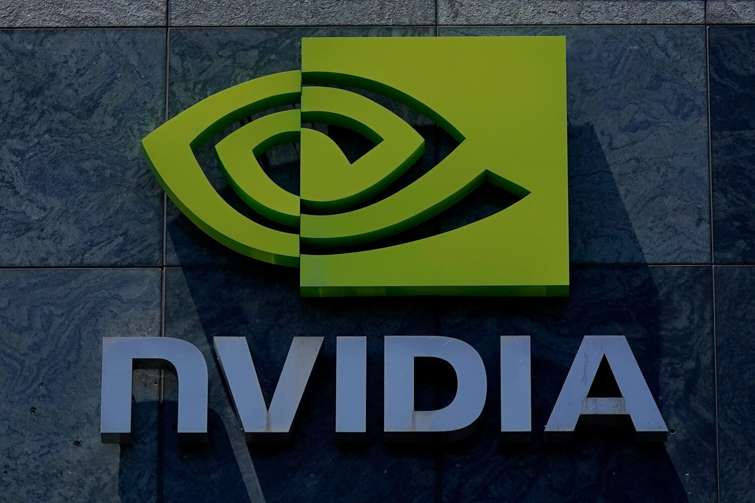FILE - A sign to a Nvidia office building is shown in Santa Clara, Calif., Wednesday, May 31, 2023....