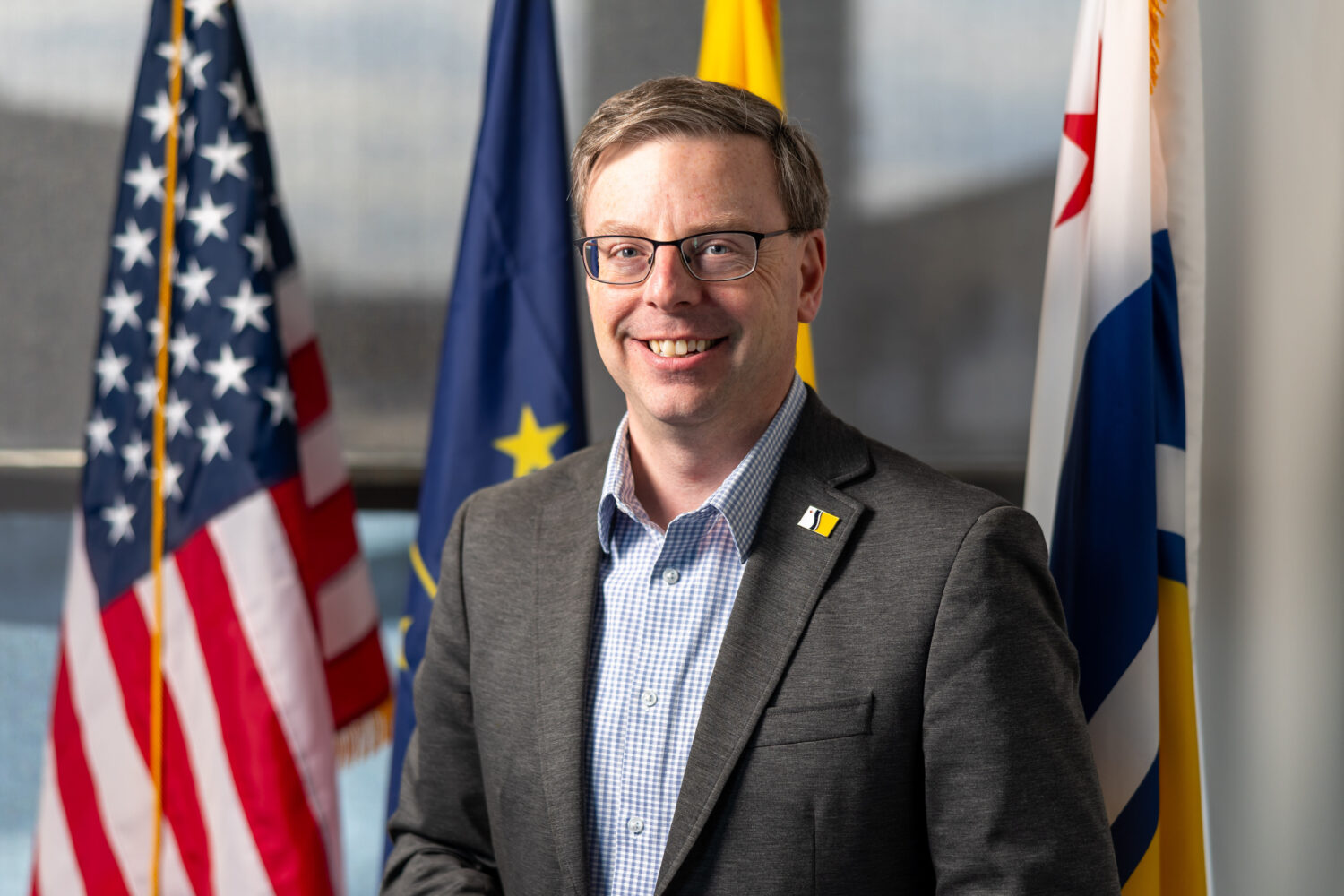Mayor James Mueller poses for a portrait Thursday, Feb. 19, 2026, at City Hall in South Bend, Ind. ...