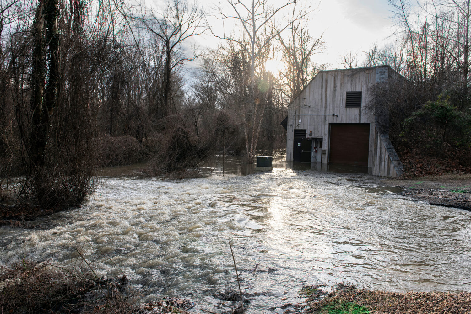 Raw sewage floods a service building after a massive sewage pipe rupture in Glen Echo, Md., Friday,...