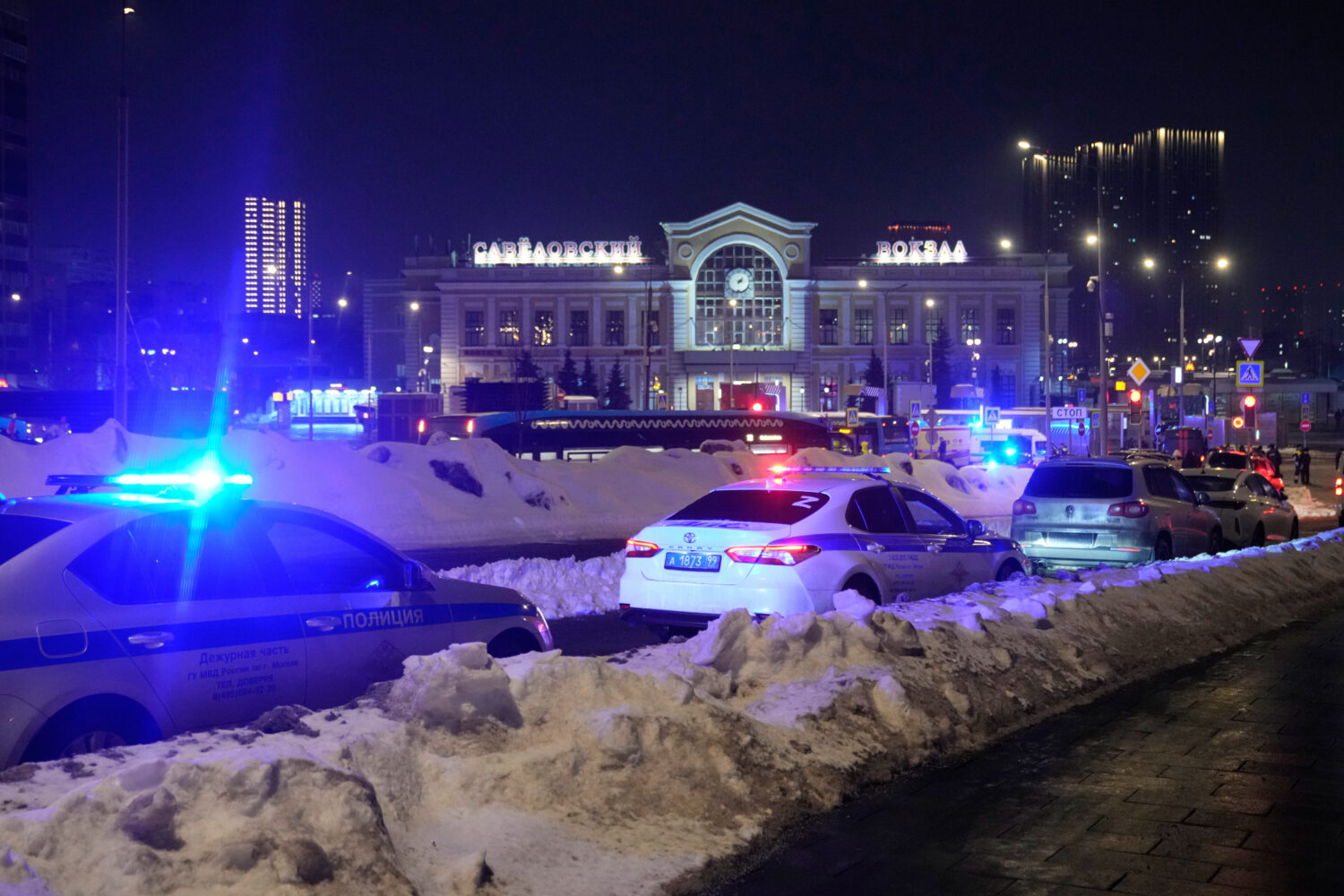 Police and emergency services are seen at the scene of an attack on a police patrol near the Savyol...