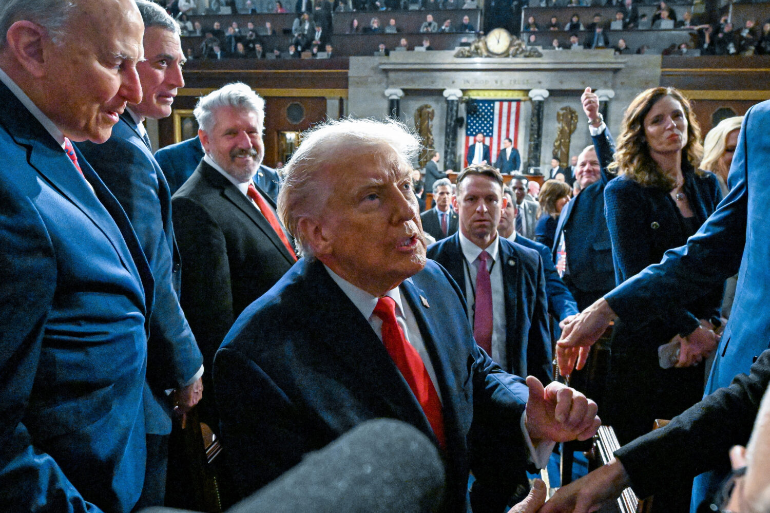 President Donald Trump exits the House Chamber after delivering the State of the Union address to a...