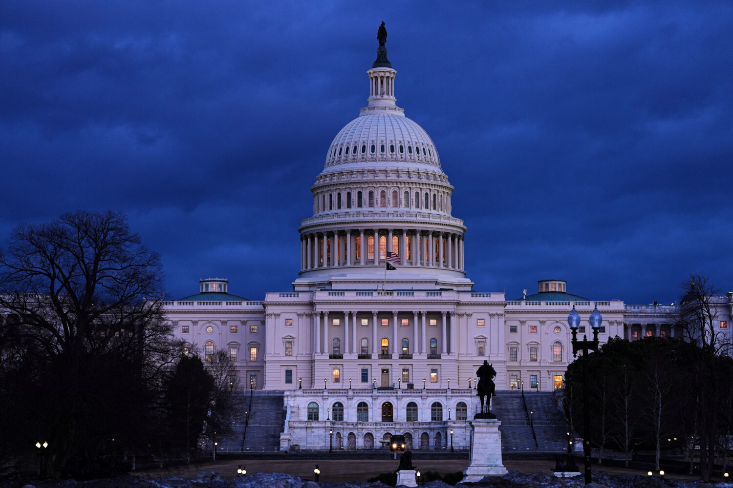 The U .S. Capitol is seen after sunset in Washington, Monday, Feb. 23, 2026, ahead of President Don...