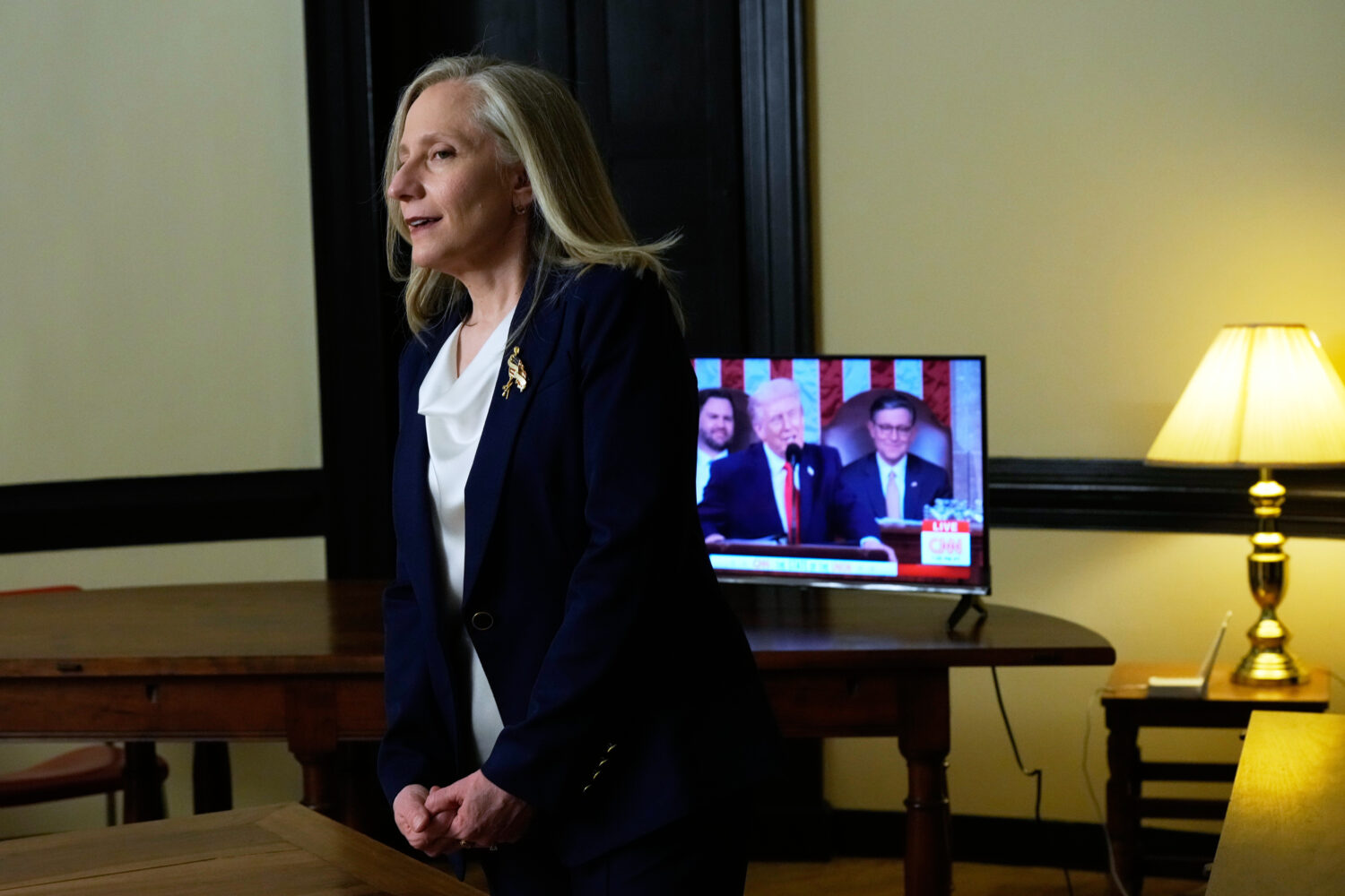 Virginia Gov. Abigail Spanberger listens to President Donald Trump's State of the Union address, Tu...