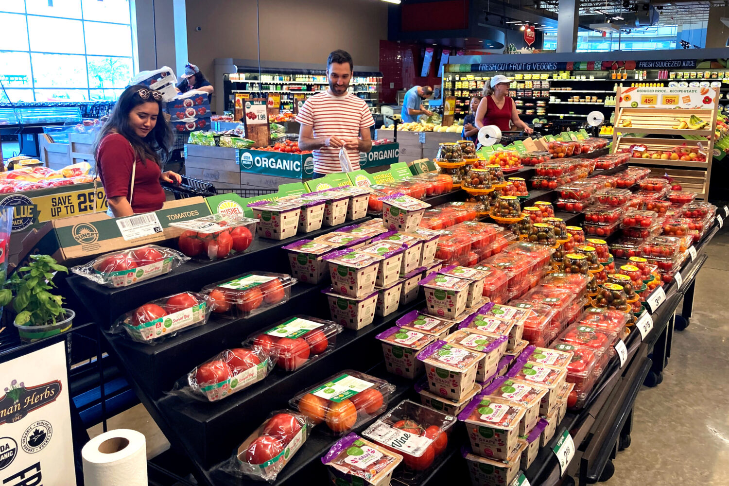 FILE - People shop at a grocery store in Glenview, Ill., Monday, July 4, 2022. (AP Photo/Nam Y. Huh...