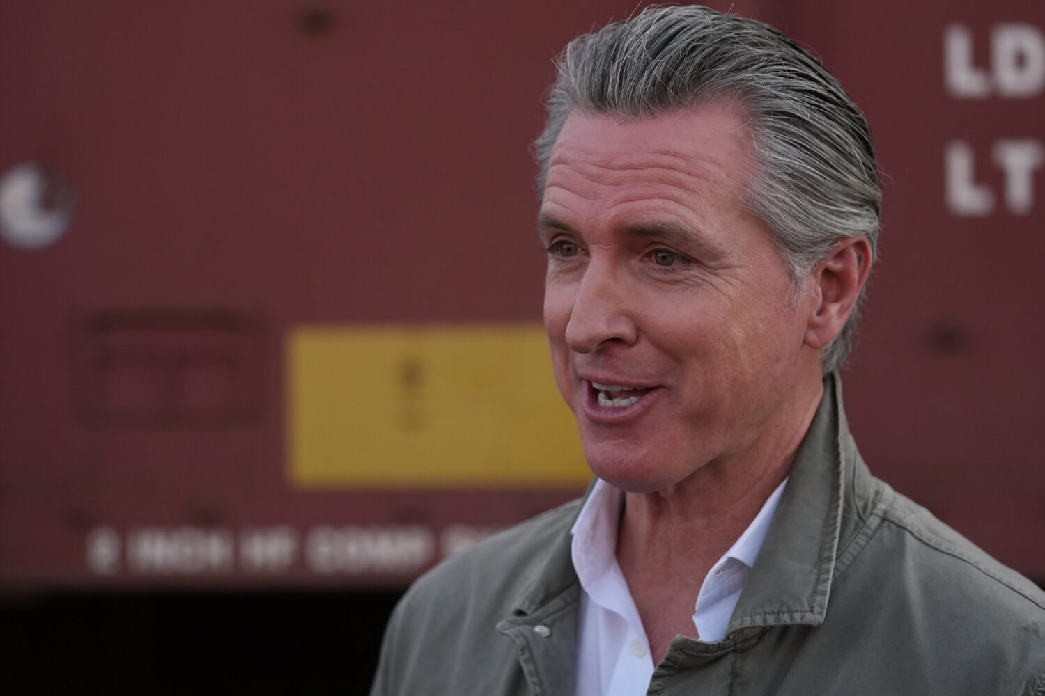 FILE - California Gov. Gavin Newsom reacts during a news conference in Wasco, Calif., Tuesday, Feb....